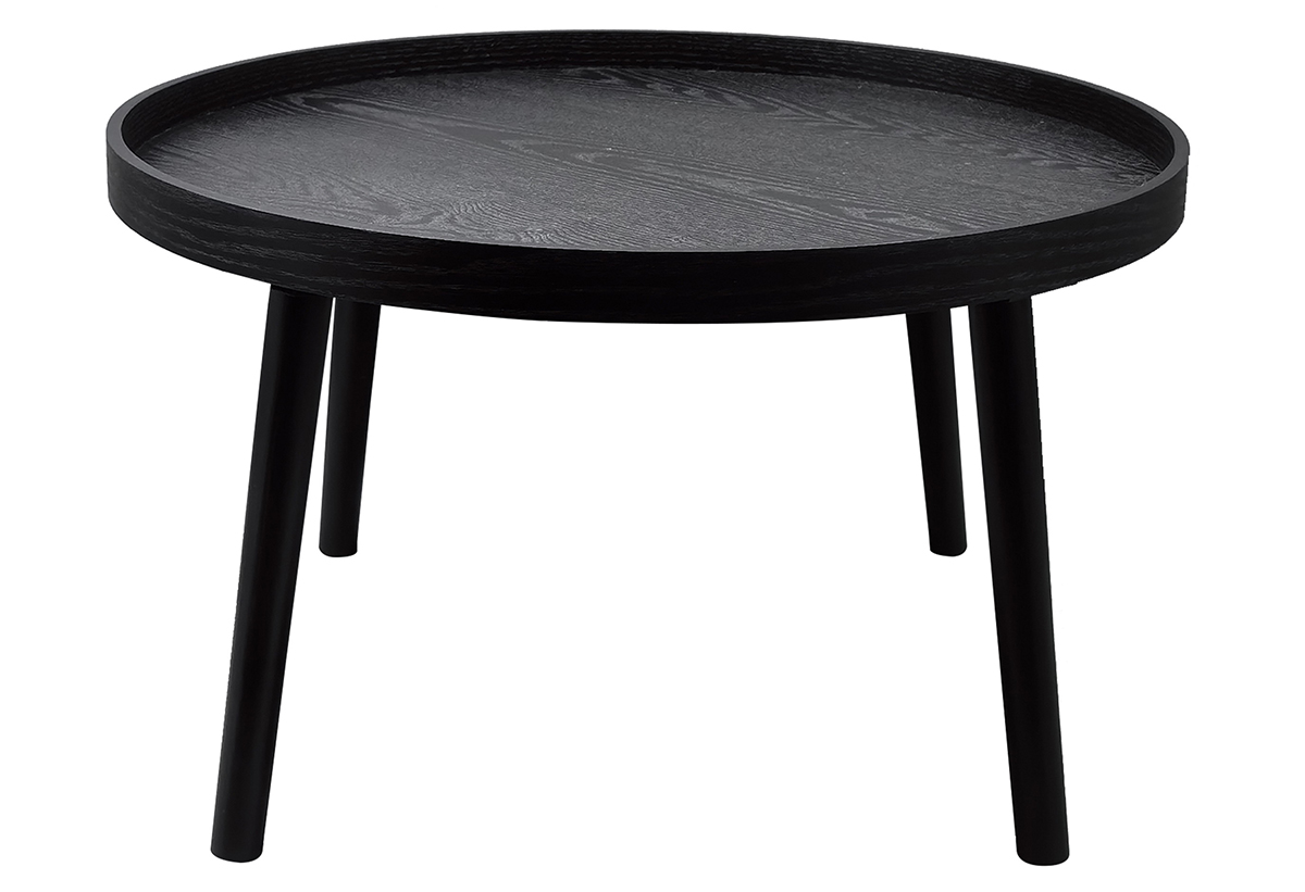 Εδώ απεικονίζεται το τραπέζι δίπλα σε μια πολυθρόνα.